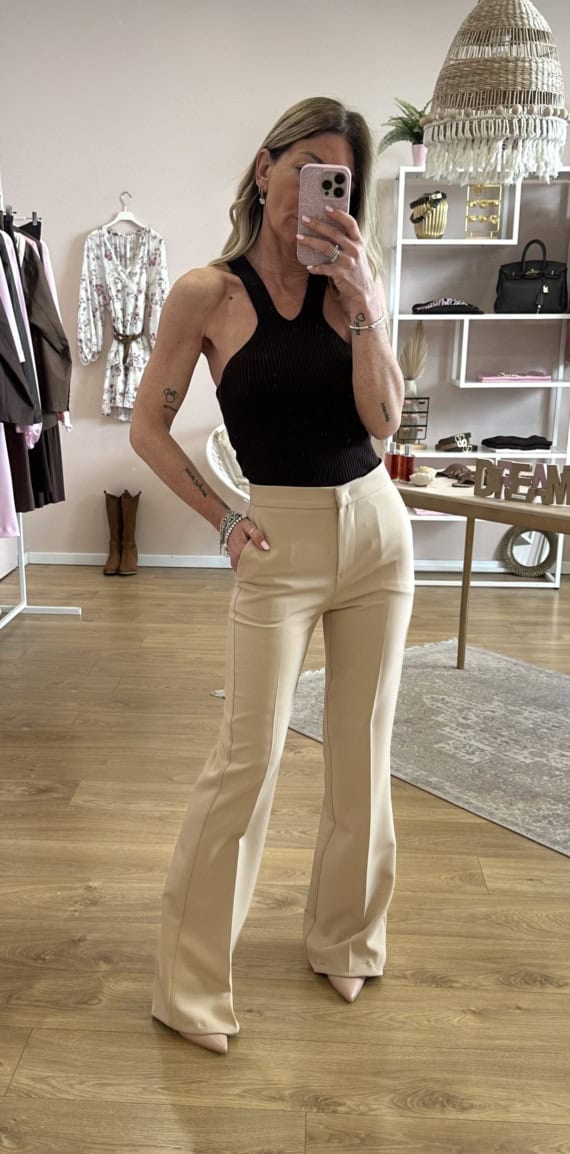Pantaloni a zampa beige - immagine 2