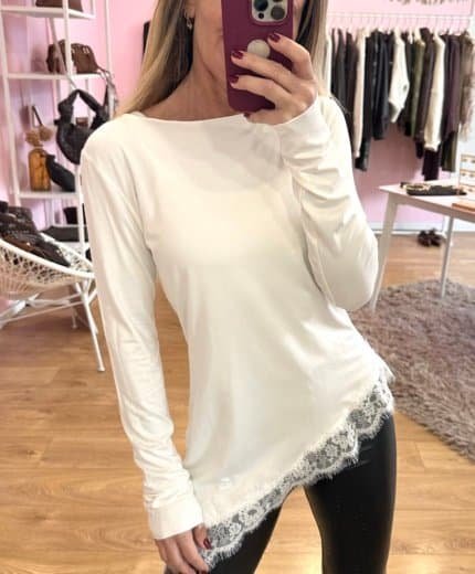 Maglia asimmetrica con pizzo
